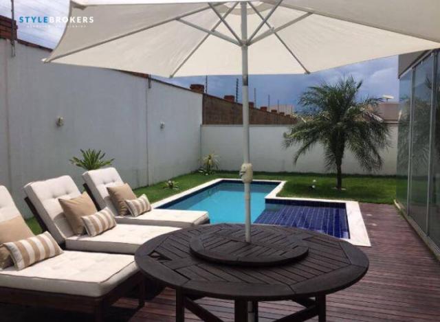 Casa estilo sobrado no Condomínio Alphaville 1 com 4 dormitórios à venda, 329 m² por R$ 1. - Foto 2