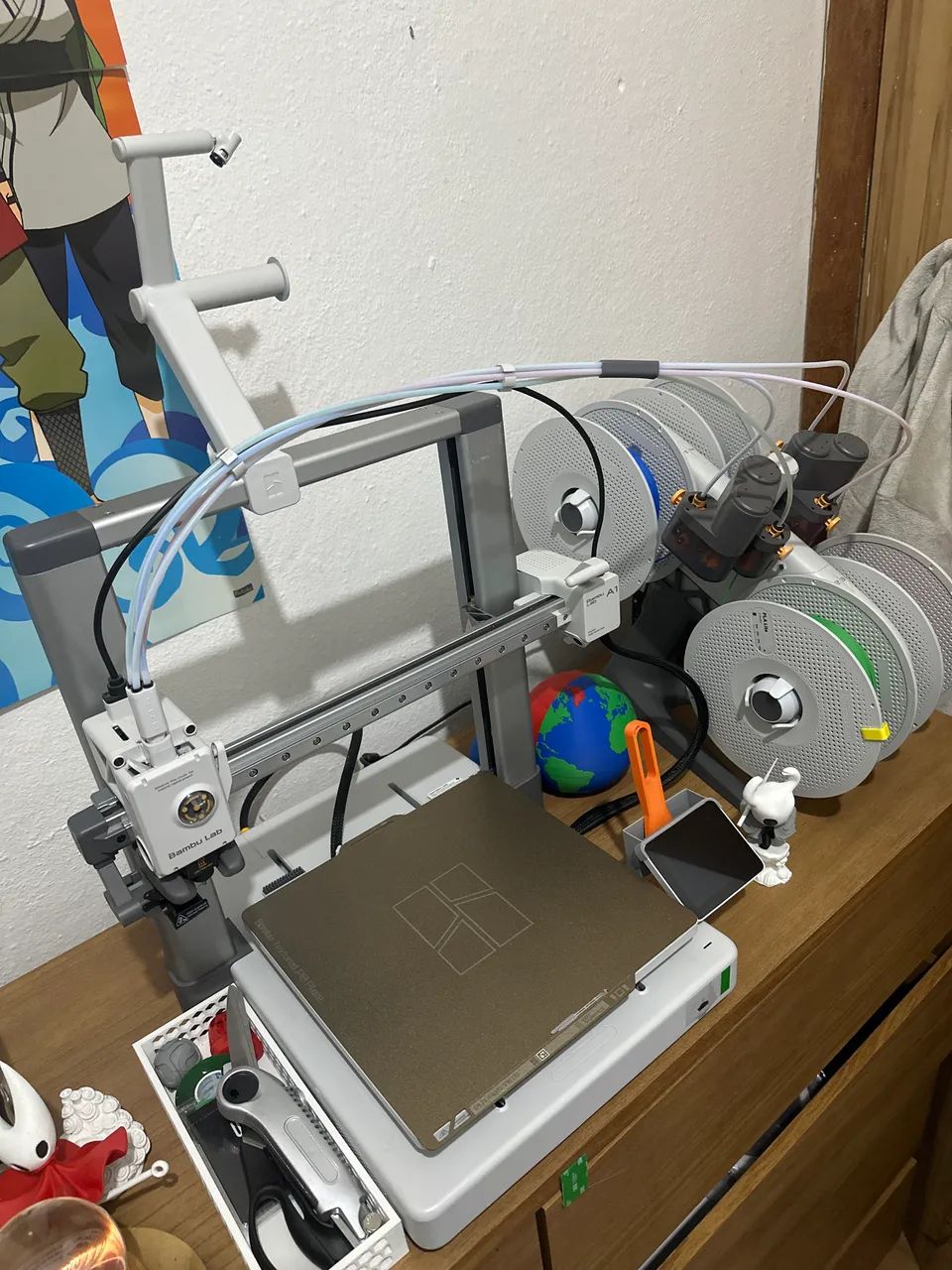 Impressora 3D Bambu Lab Combo AMS multicolorida 