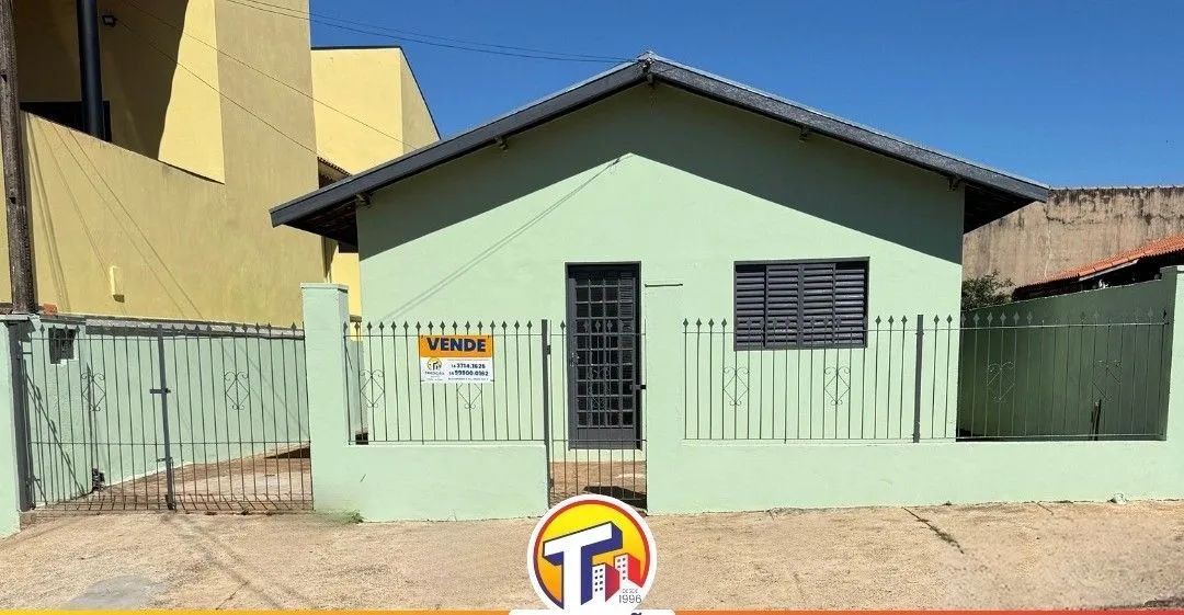 Casa com edícula nos fundos 