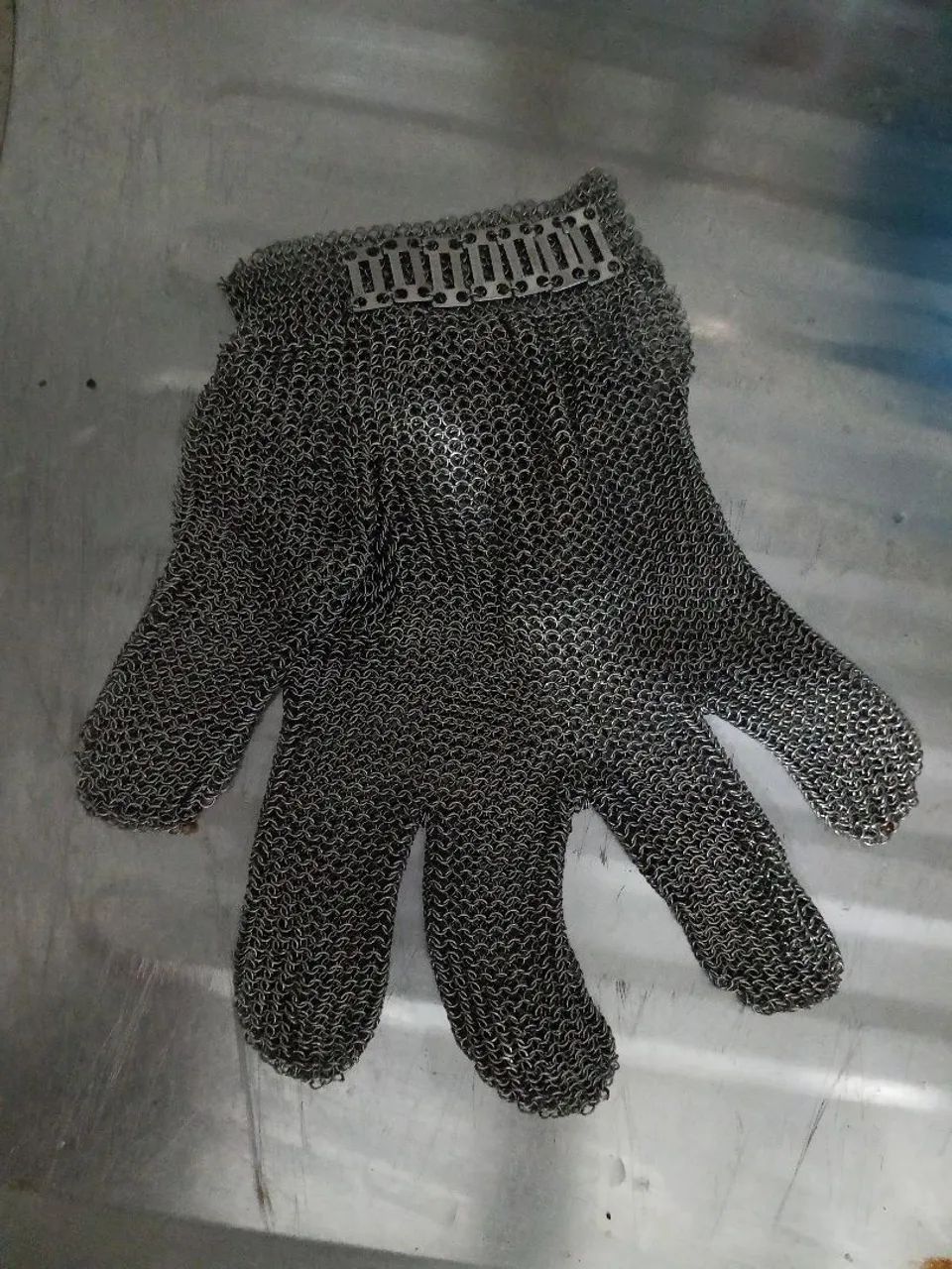 Luva de aço para açougueiro.