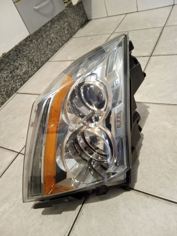 Farol esquerdo Cadillac Cts 