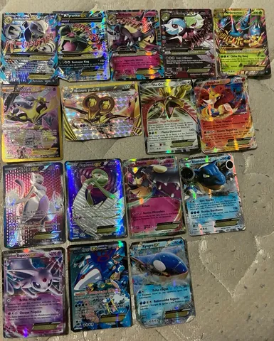 9 Cartas Pokemon Originais Eevee Incluindo Gx + Brindes