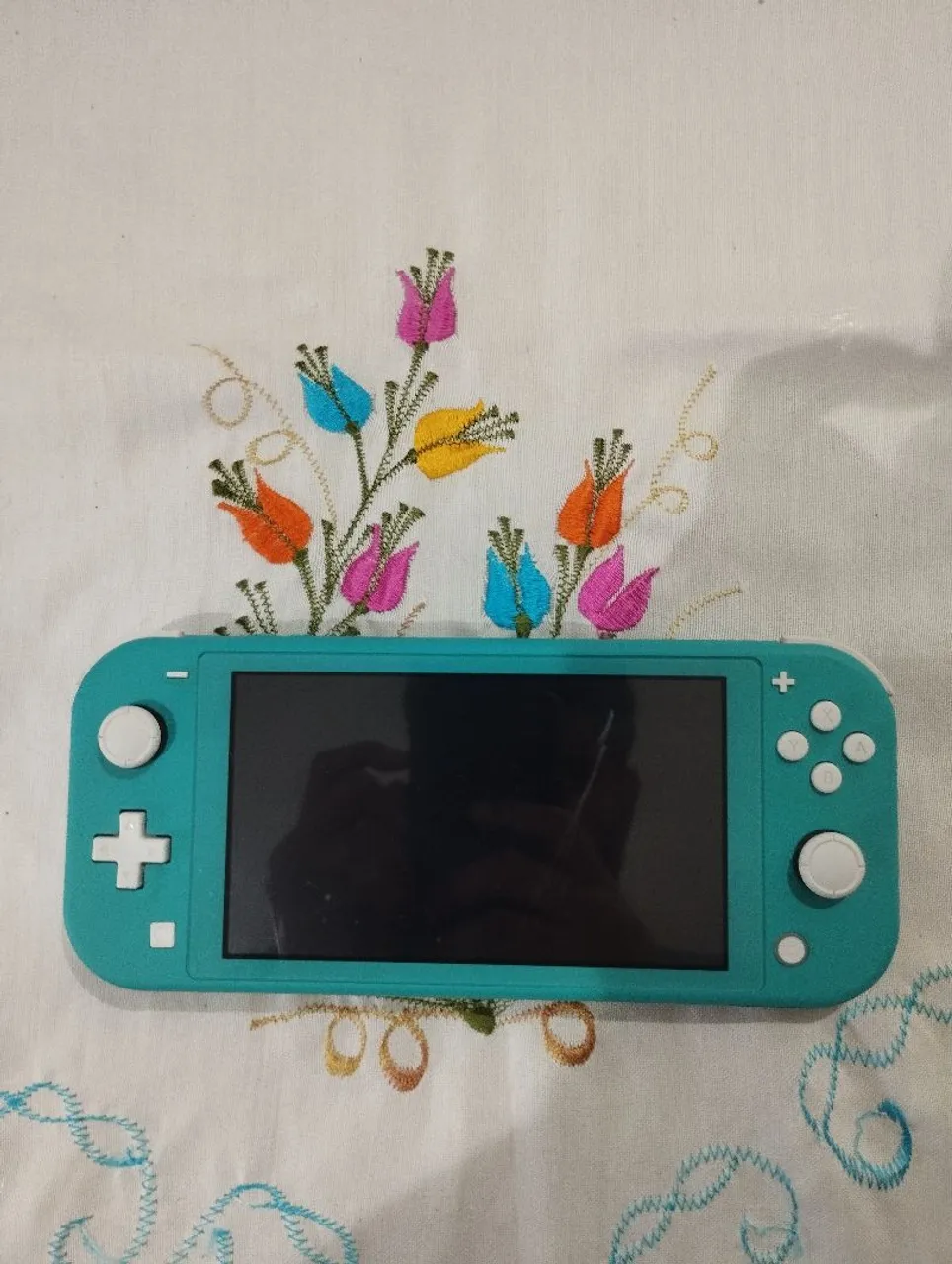 Nintendo switch lite com dois jogos mídia física