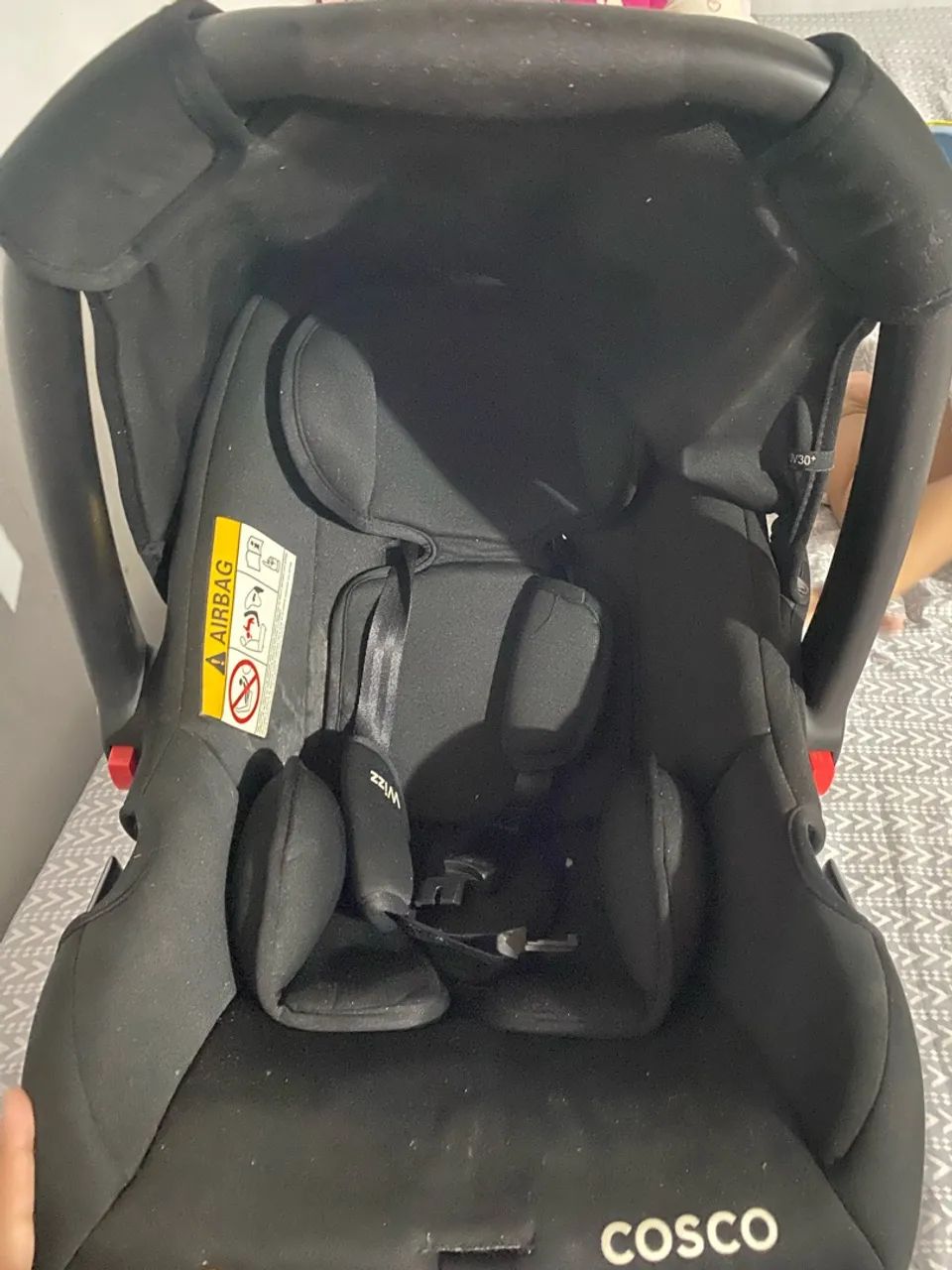 Bebê conforto cosco.