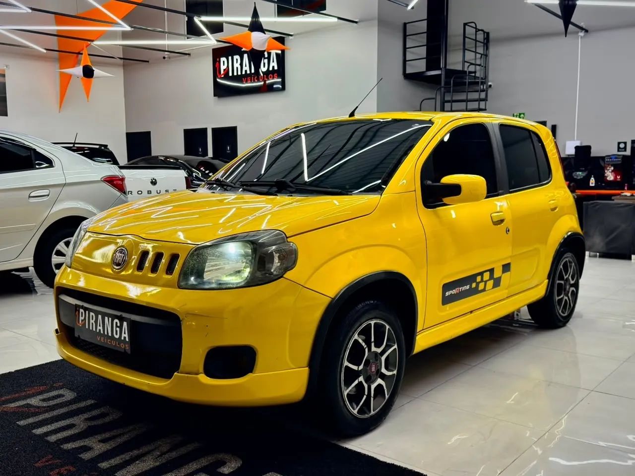 Fiat Uno Sporting 1.4 EVO Fire Flex 8V 4P 2012 - Foto 4