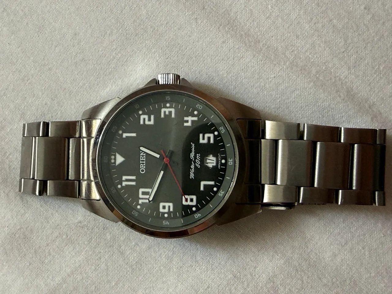 Relógio Orient a pilha com pulseira de metal.  - Foto 5