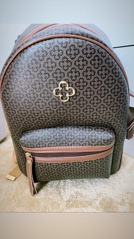 Bota over e bolsa ( mochila)