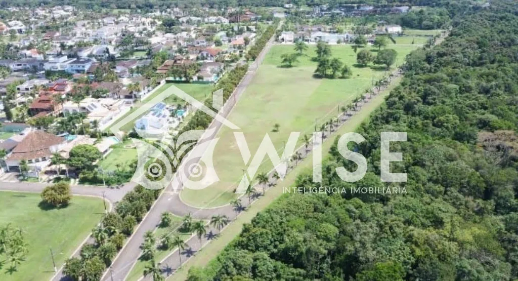 Terreno de 9.575 m² no condomínio Acapulco, Guarujá.