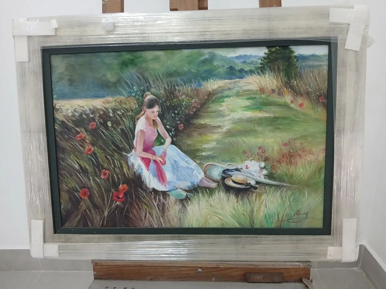Quadro de pintura a óleo, mulher em um campo, 60x40cm moldura em prata
