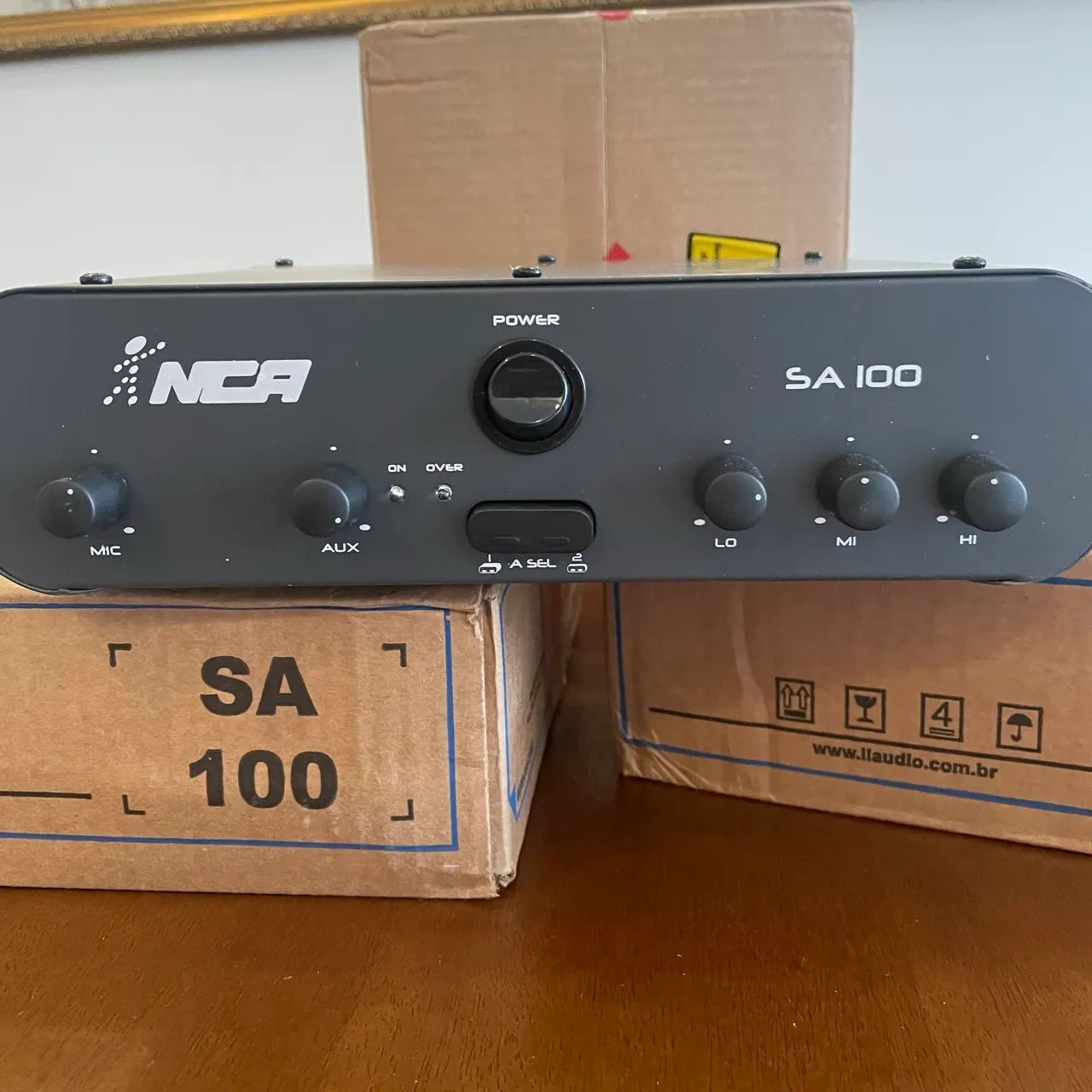 Amplificador com entrada para microfone 