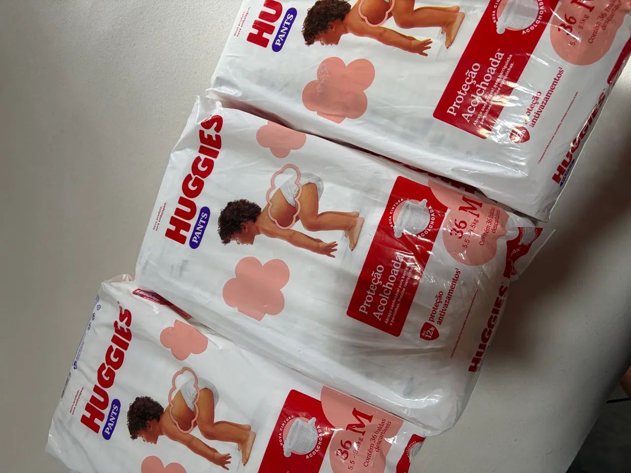 3 pacotes de fraldas Huggies M 36 
