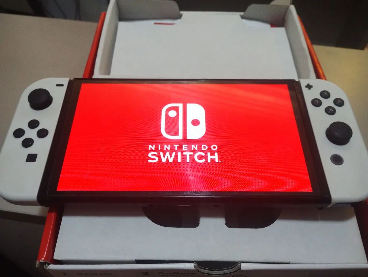 NINTENDO switch oled com caixa e película  - Foto 3