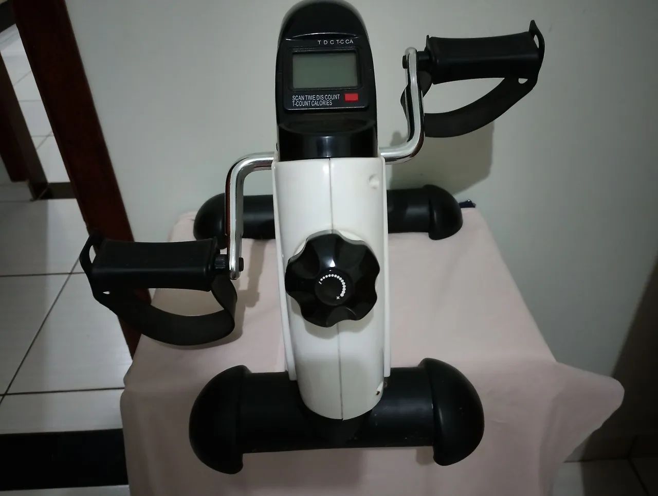 Massageador e bicicleta ergométrica 
