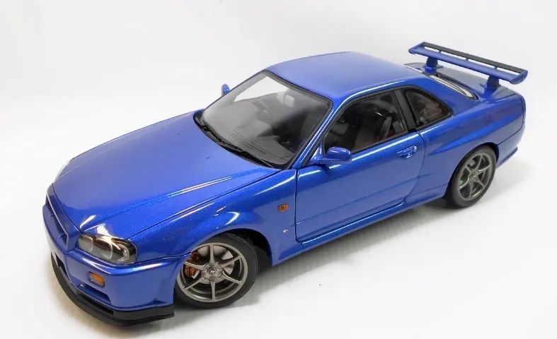 自動車 AUTOart NISSAN SKYLINE GT-R V-SPEC II Nissan Skyline GT-R (R34) V-Spec II 1:18 Autoart Azul - 20 anos
