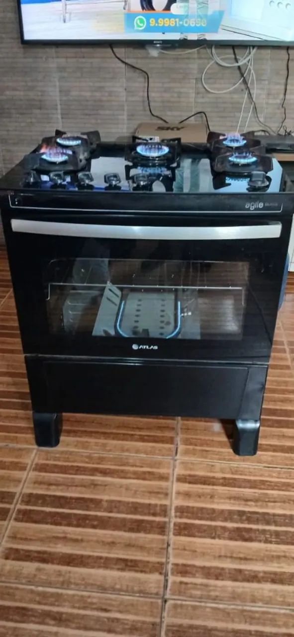 Vende-se fogão 5 bocas mesa de vidro 