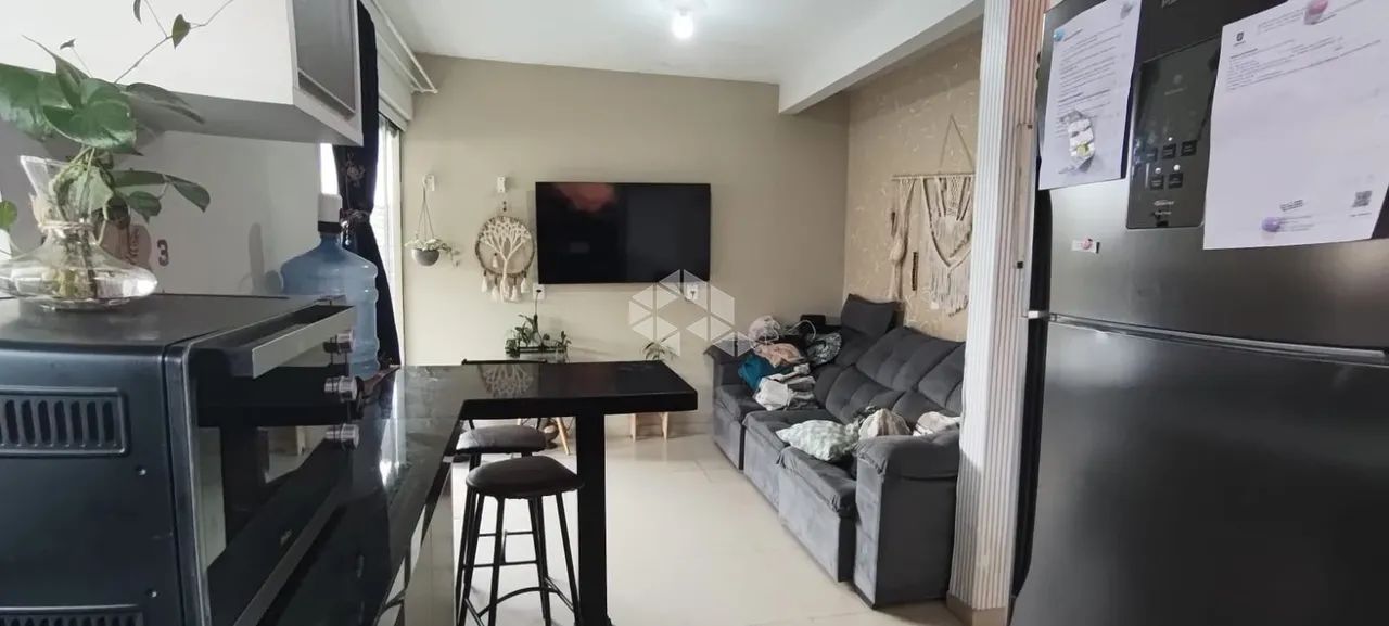 CASA COM 2 DORMITÓRIOS EM FLORIANÓPOLIS - SC, BAIRRO TAPERA DA BASE À VENDA