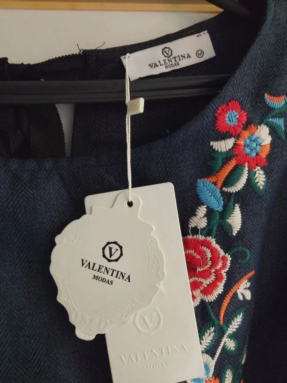 Blusa com detalhe floral - Foto 3