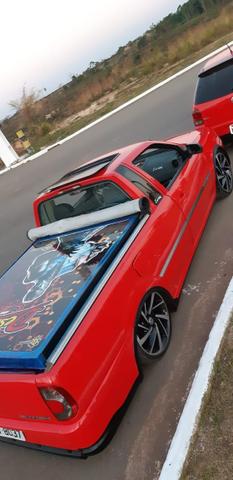 Saveiro G4 2009/2009 titan com som automotivo