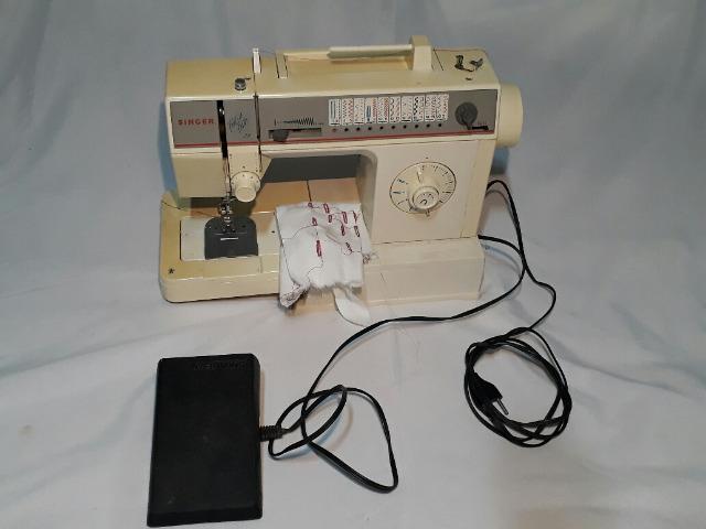 Máquina de costura singer pret a porter 21