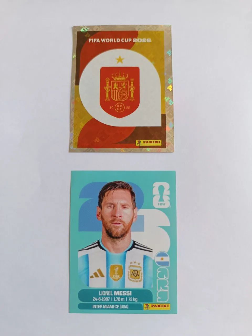 Vendo figurinha da Copa, Messi e escudo da Espanha 