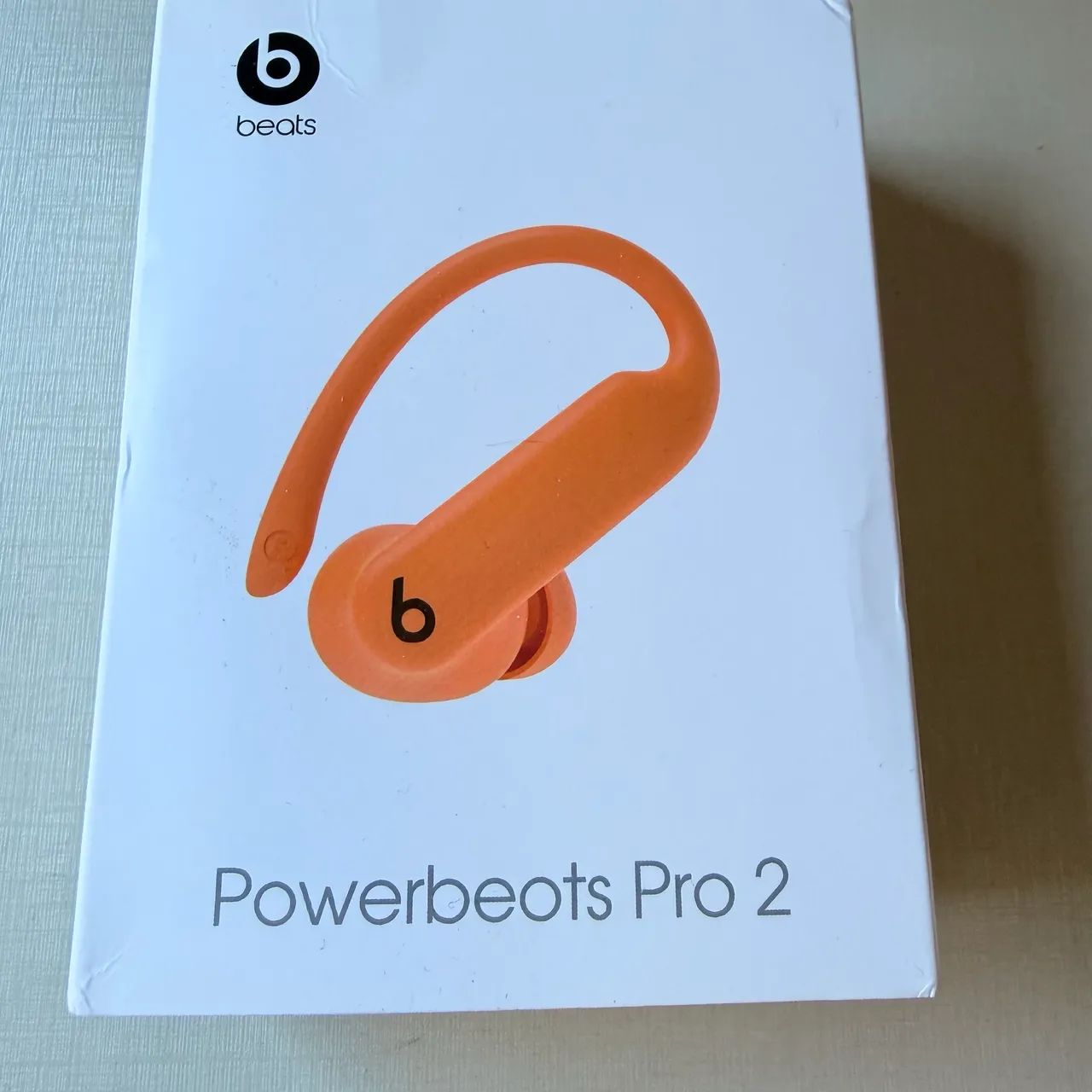 Powerbeats Pro 2 na cor laranja - Fones de Ouvido - João Aranha