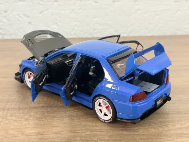 Miniatura Mitsubishi Lancer Evolution Ix Azul (1:24) Luz E Som - Foto 2