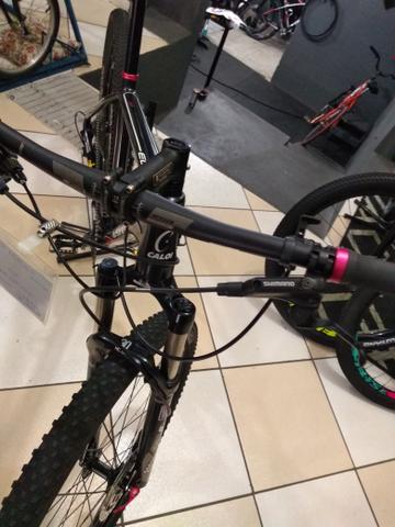 Bicicleta aro 29 Caloi,kit XT suspensão vc a ar - Foto 6