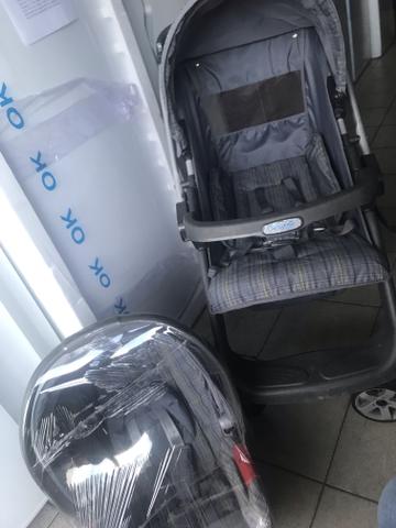 Vendo carrinho com bebê conforto - Foto 4