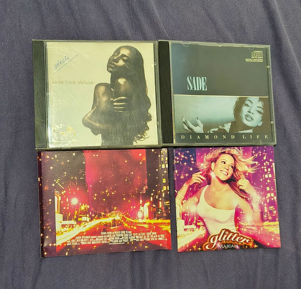 Encartes: Sade, Mariah Carey e Pulp Fiction (SEM OS CDS)