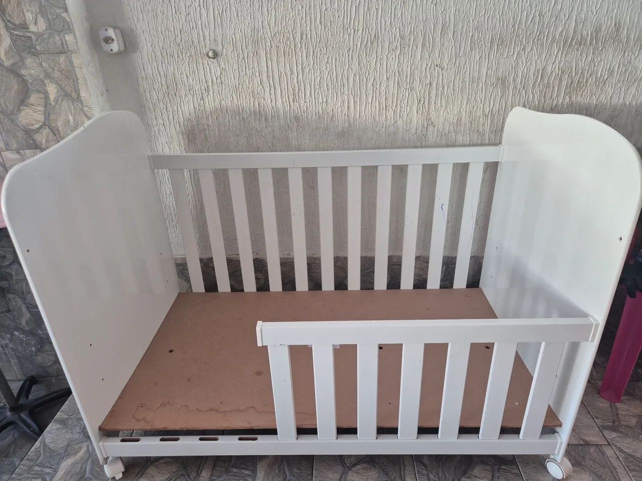 Berço transformado em cama 
