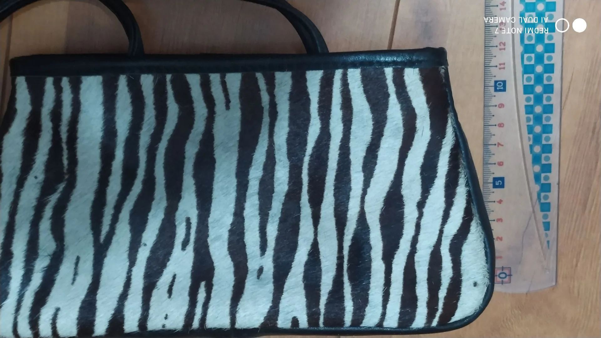 Bolsa e Mule couro zebra natural 