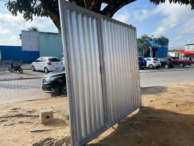 Sliding gate with pedestrian door64363474339459121