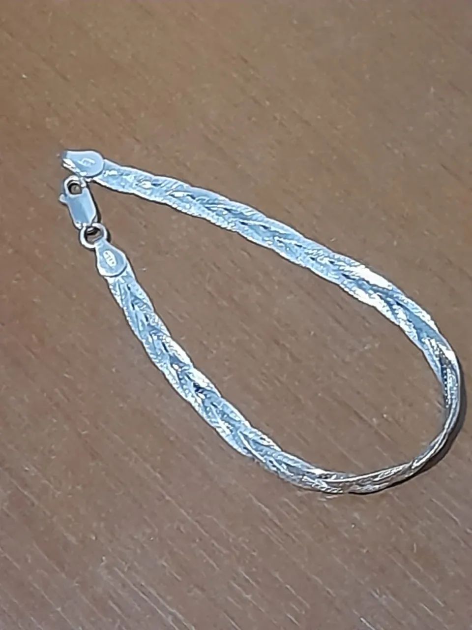 Pulseira prata modelo trançada Feminina - Foto 4