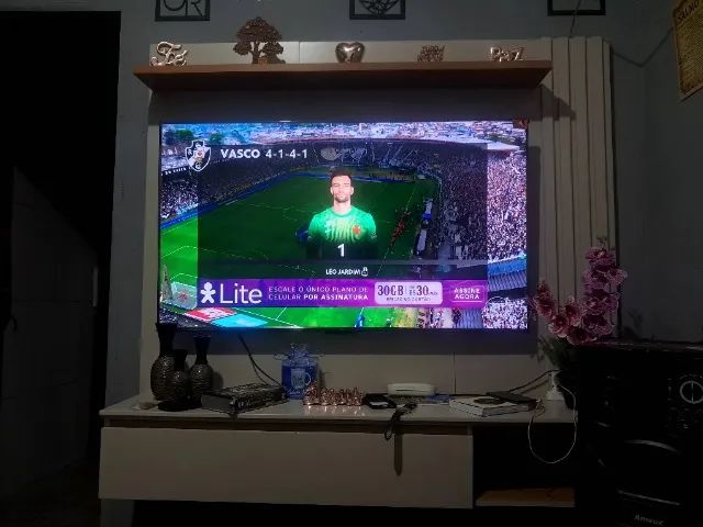 Rack painel + televisão tcl 55 polegadas nova