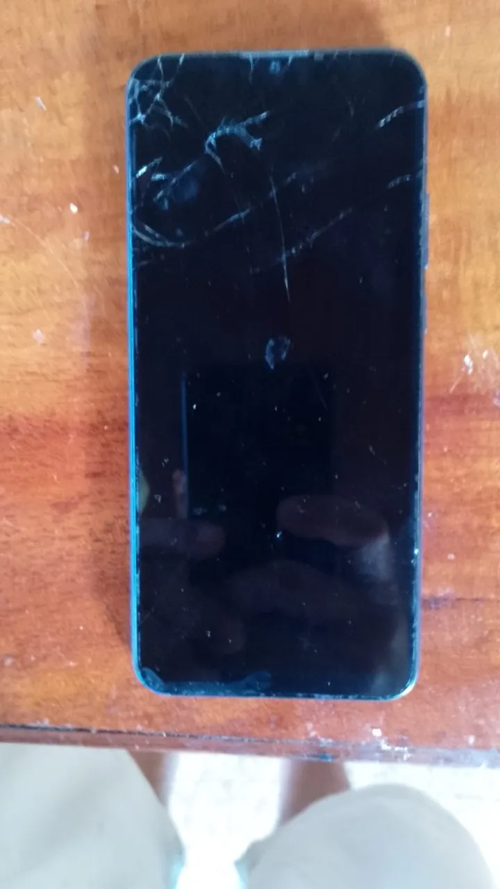 celular com defeito