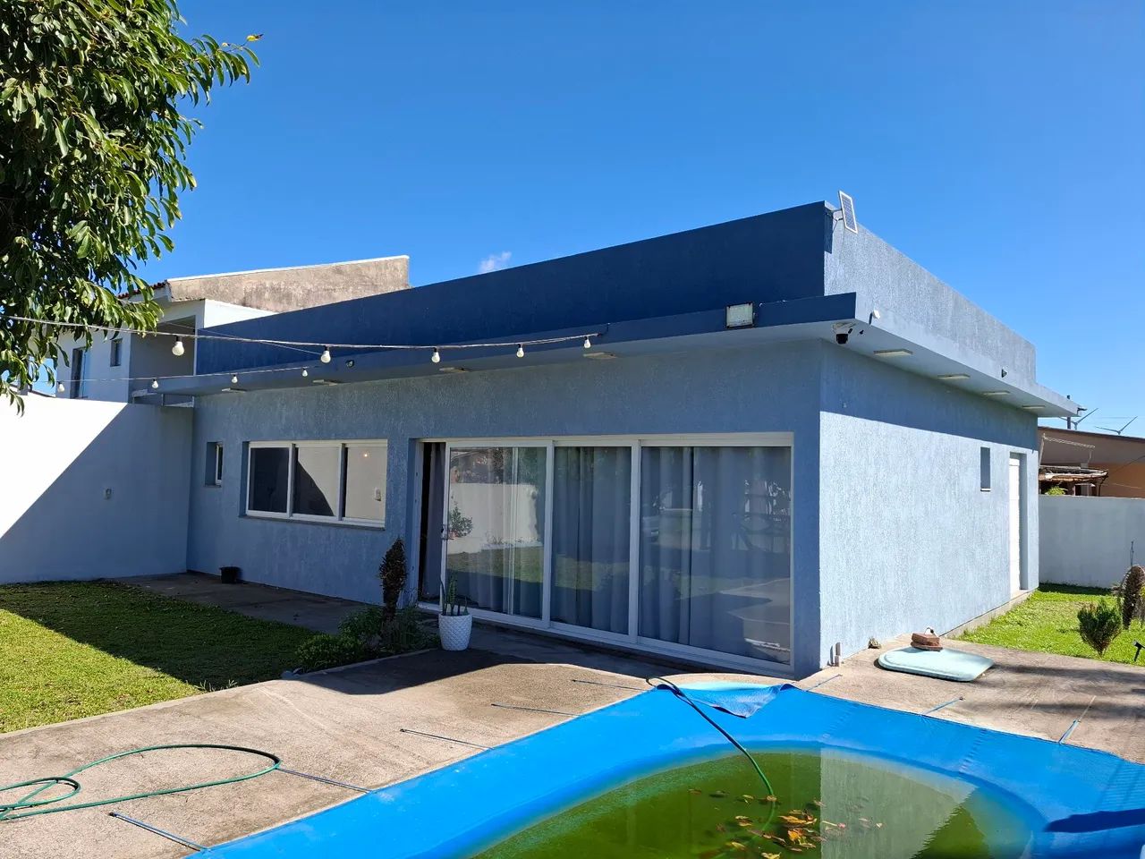 Casa em Tramandai com piscina terreno de esquina 