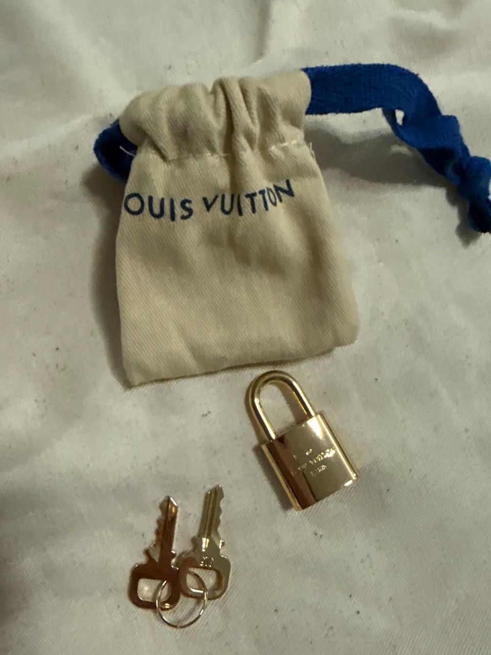 Cadeado Louis Vuitton 