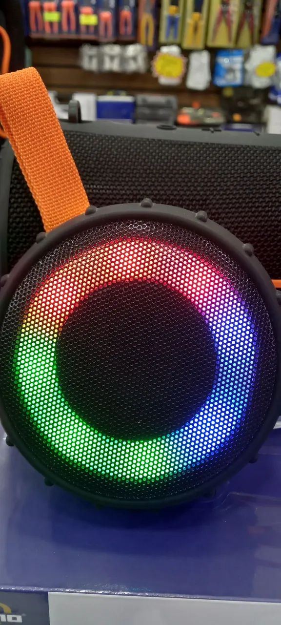 Caixa de som Bluetooth redonda com alça. Iluminação RGB  - Foto 3