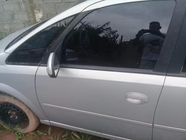 Porta dianteira L esquerdo e direito completa sem retrovisor meriva usada original