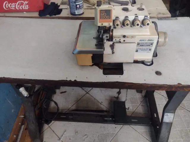 maquina interloque funcionando super bem !! entrega gratis, garantia e acessorios zap 0219