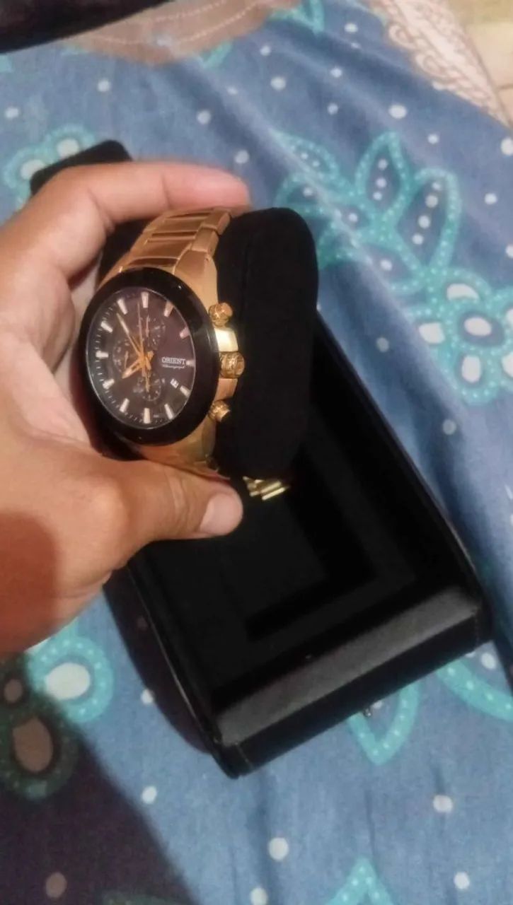 Relógio oriente dourado semi novo  - Foto 3