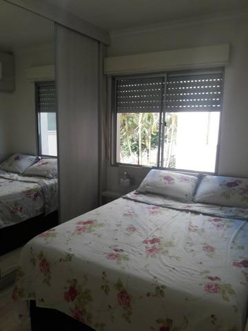 Apartamento 2 dormitórios semi mobiliado com vaga de estacionamento - Foto 9