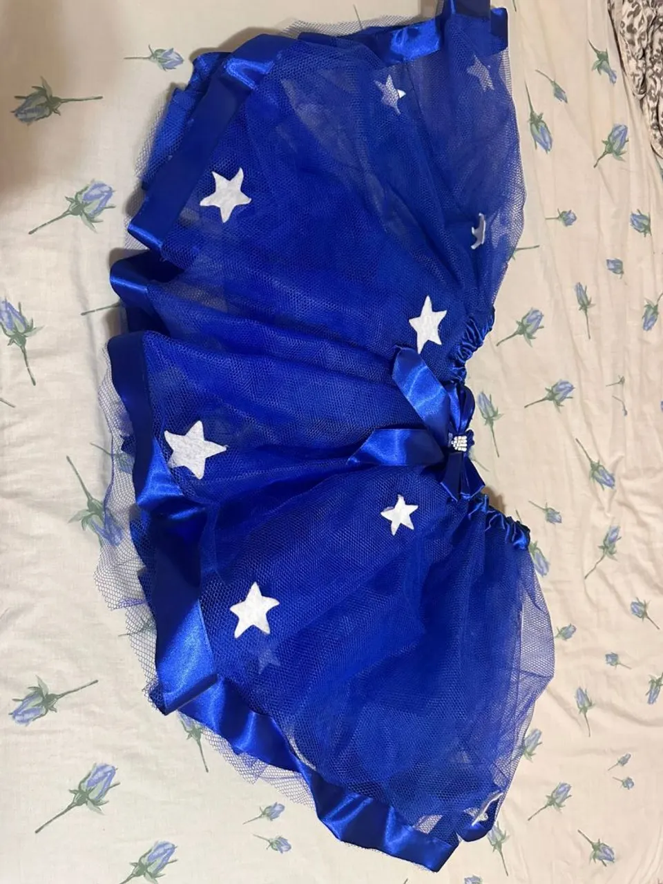 Saia tutu azul com estrelas