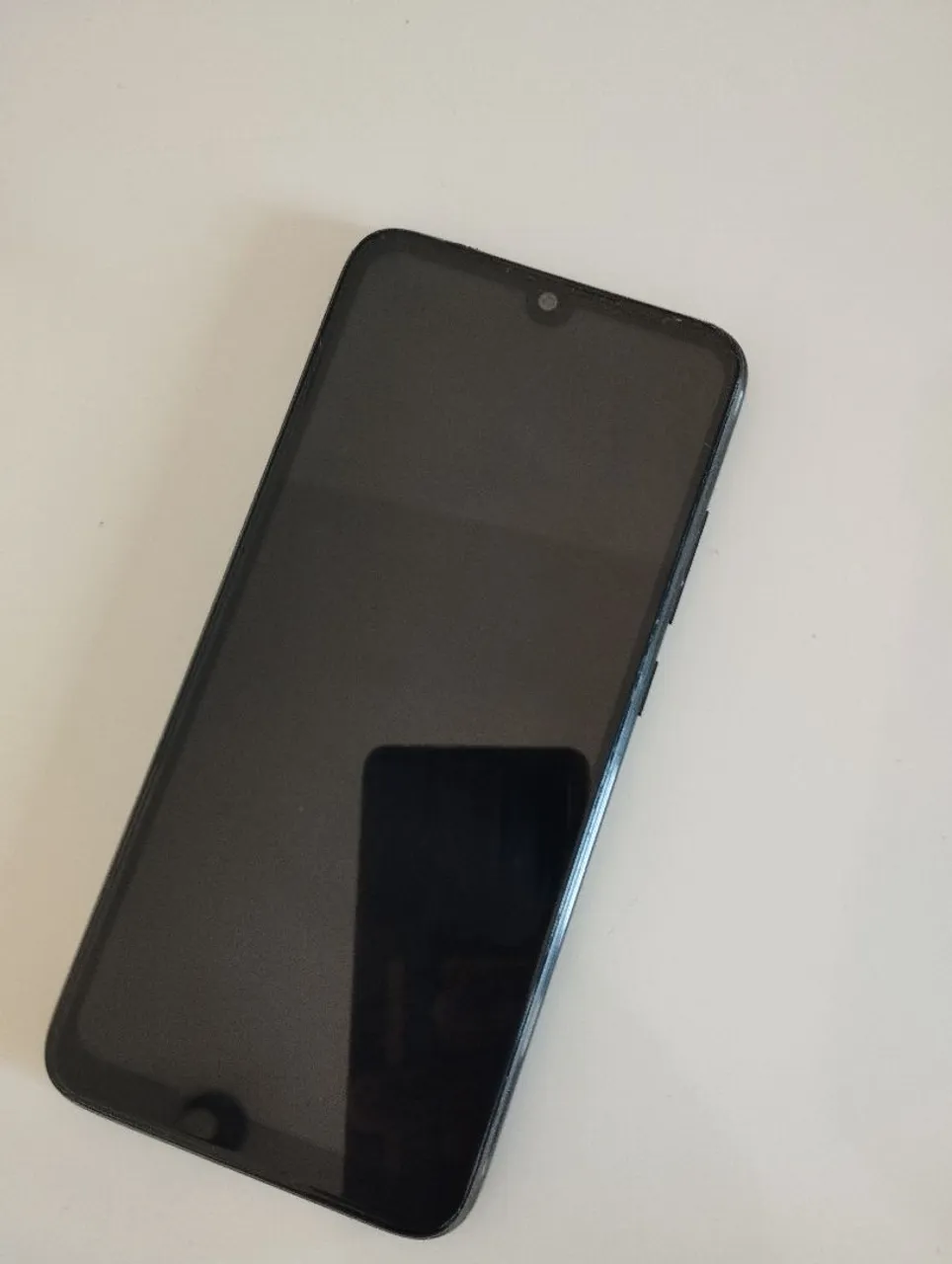 Redmi note 7 usado em bom estado com tela nova, película 3D e com manual