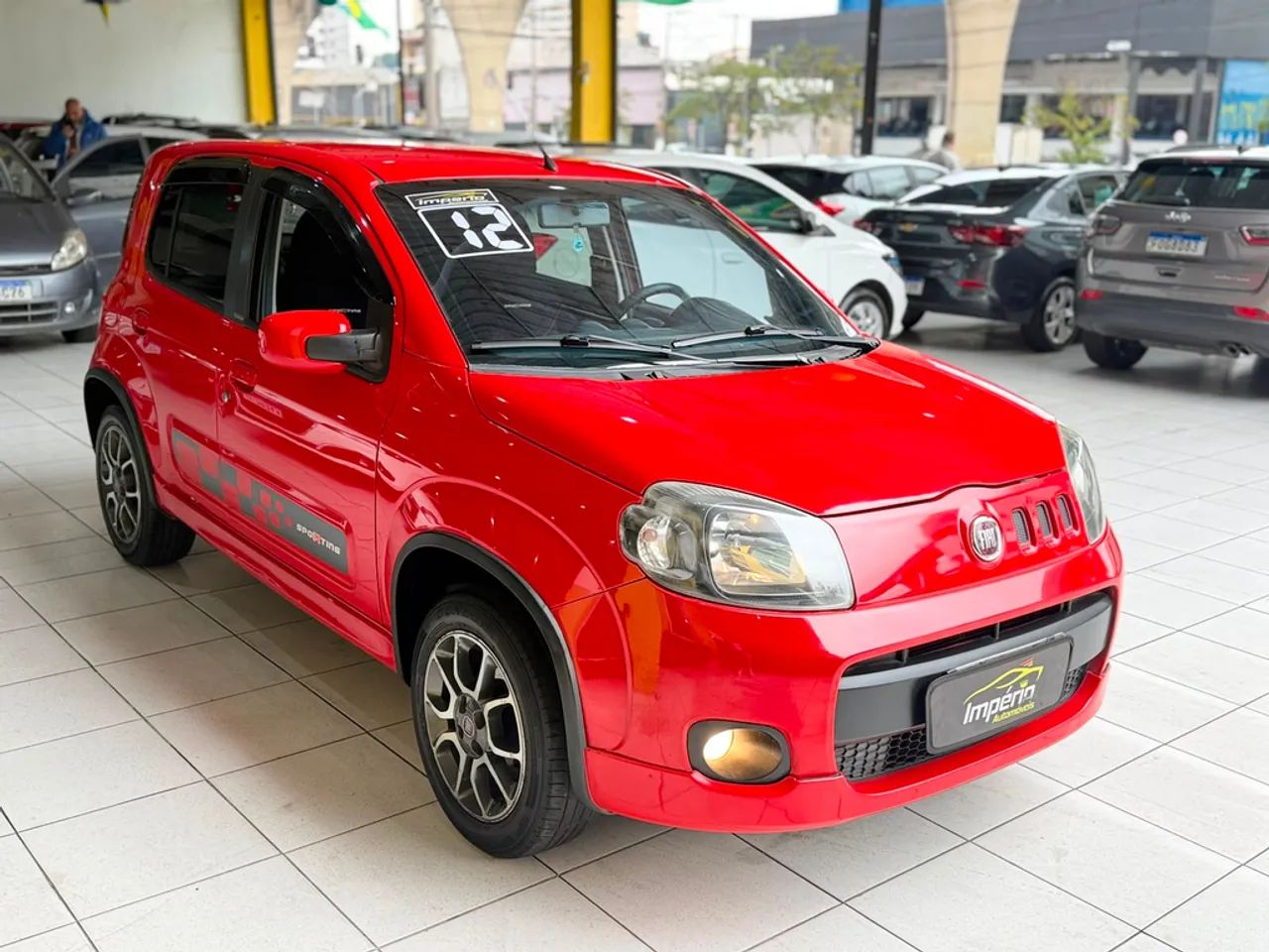 Fiat Uno Sporting 1.4 EVO Fire Flex 8V 4P 2012 - Foto 3