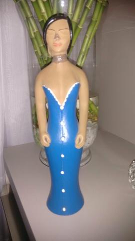 Boneca em cerâmica