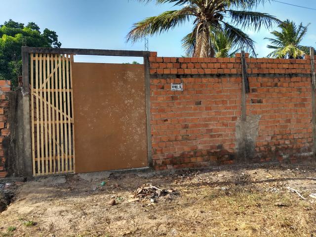 Vendo terreno 12 x 40 com alicerces, todo murado