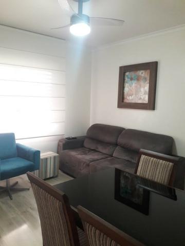Apartamento 2 dormitórios semi mobiliado com vaga de estacionamento - Foto 2