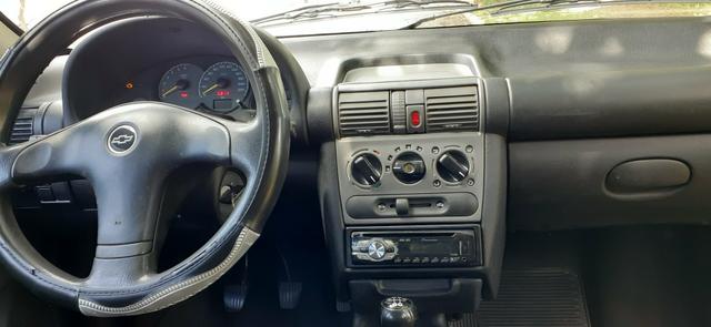 Corsa sedan 2006 - Foto 6