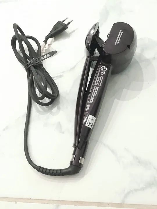 Modelador de cachos automático